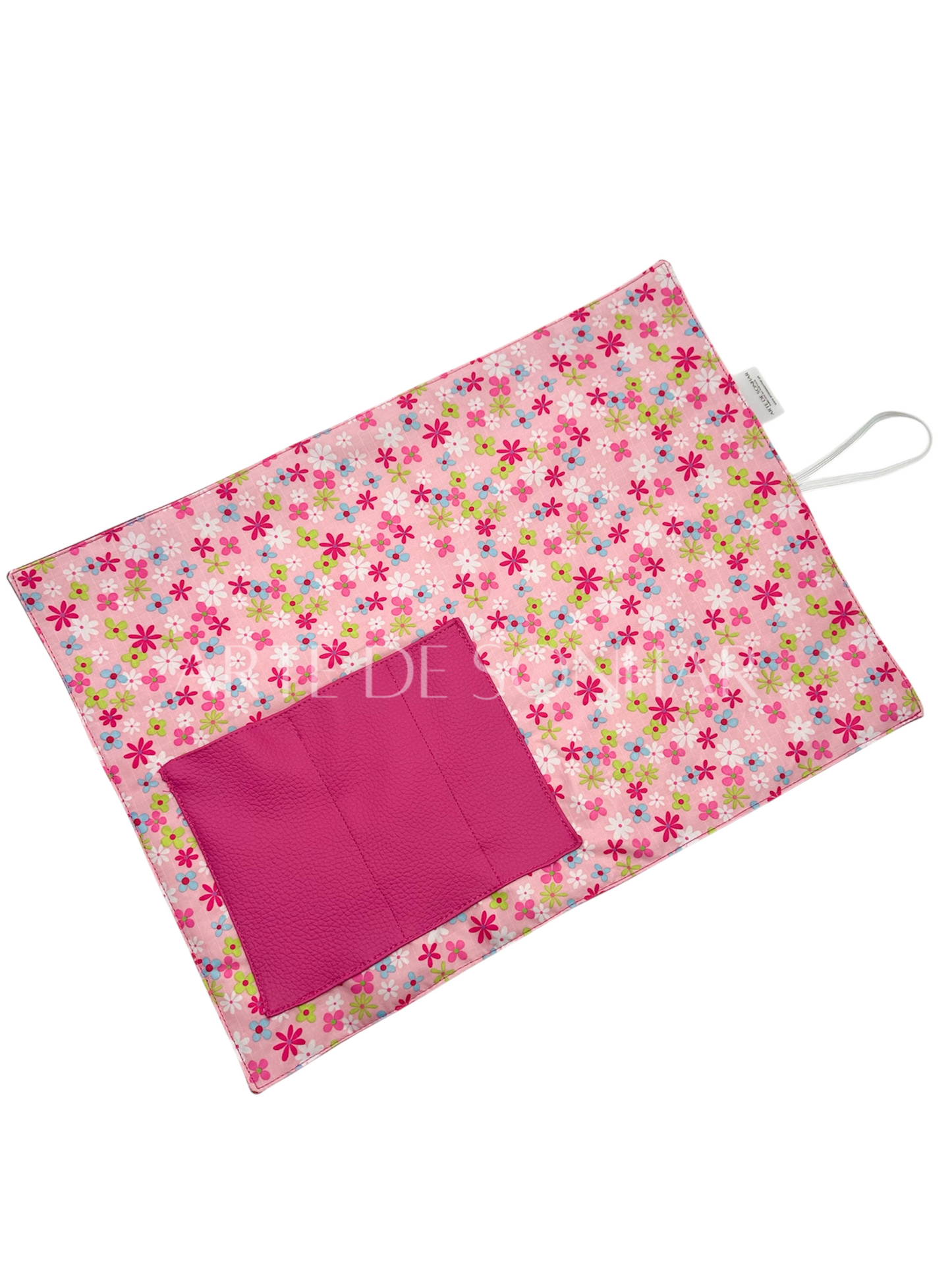 Individual de mesa rosa com flores