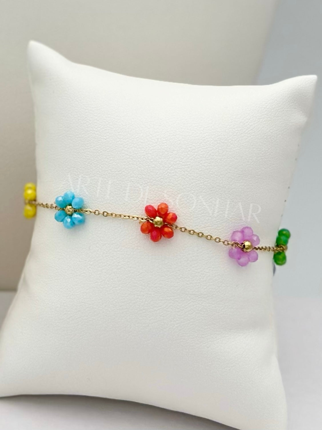 Pulseira de flores multicor