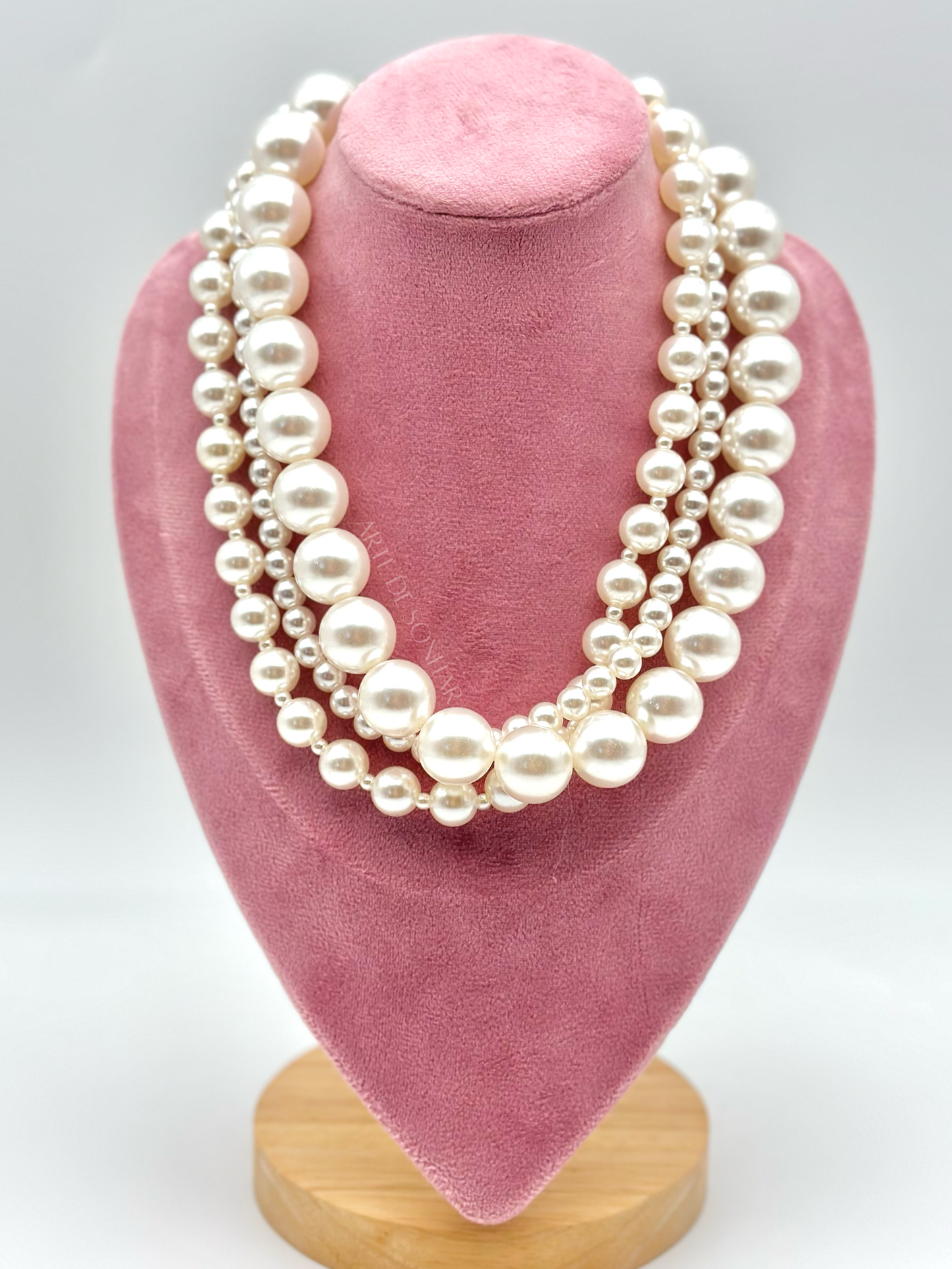 Colar de pérolas triplo