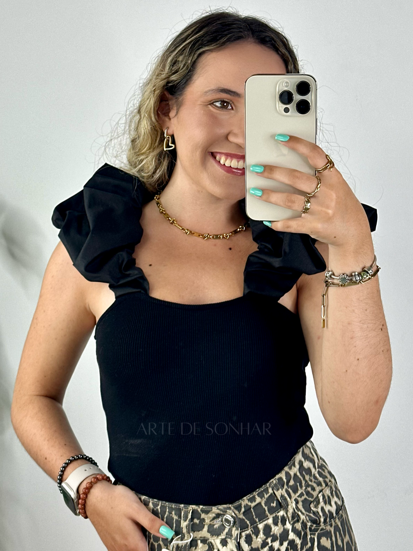 Top de malha de frufru
