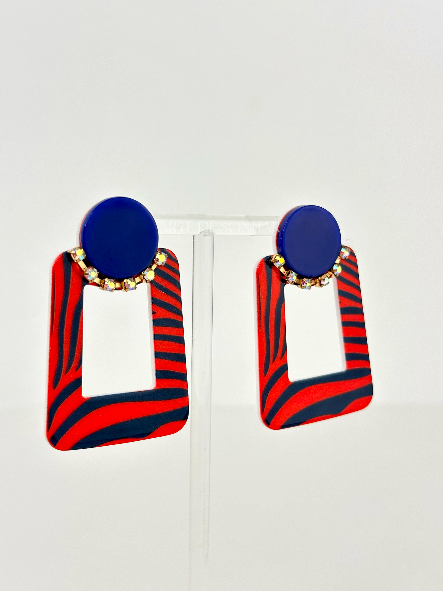 Brincos zebra vermelho e azul marinho com cristais brilhantes