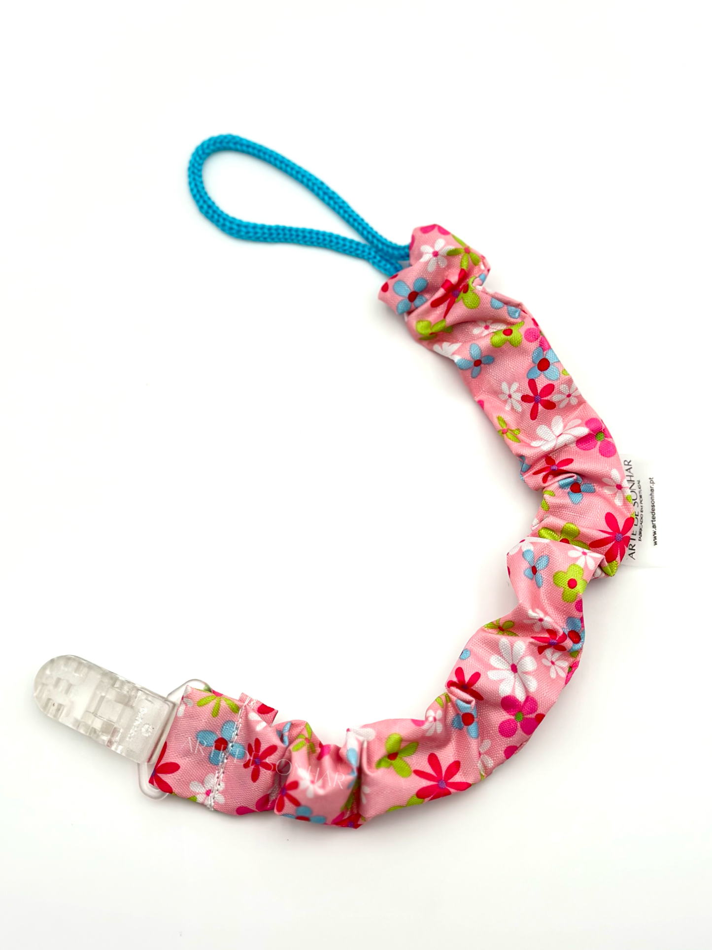 Prendedor de chucha rosa com flores