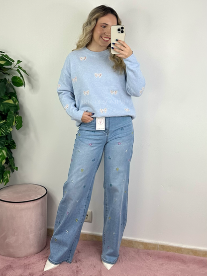 Camisola de malha azul com laços e flores