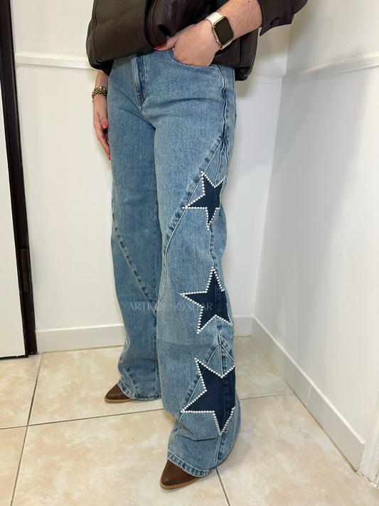 Calças de ganga com estrelas azuis