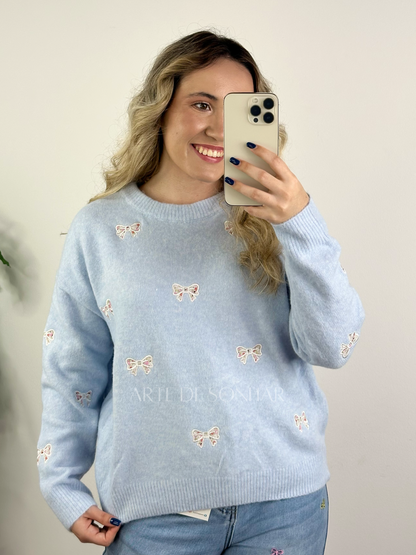 Camisola de malha azul com laços e flores