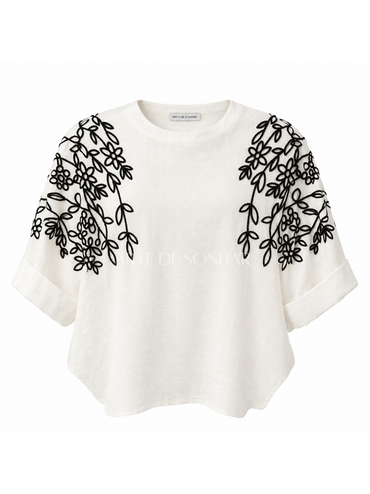 Camisola de malha branca com desenho floral preto
