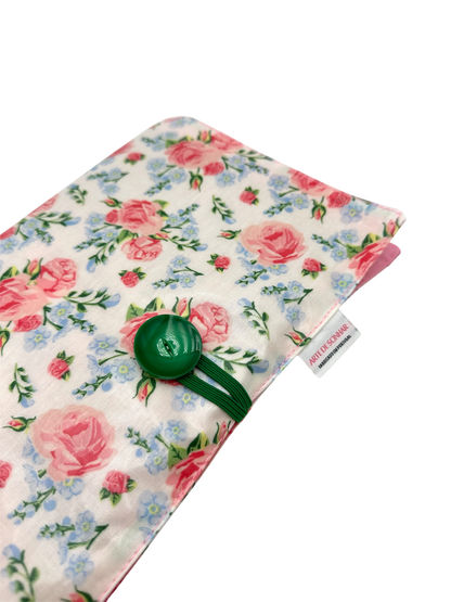 Capa de livro com flores rosa e azul