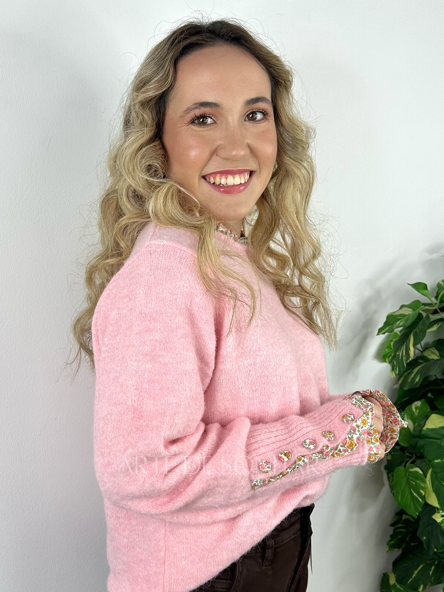 Camisola de malha rosa com florzinhas