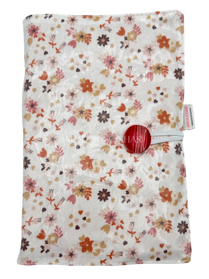 Capa de livro com flores bege