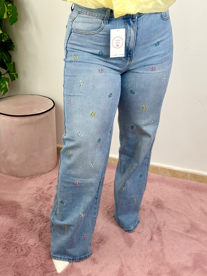 Calças de ganga com lacinhos