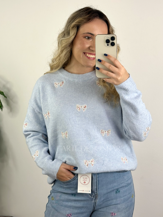 Camisola de malha azul com laços e flores