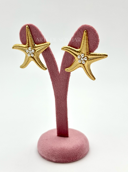 Brinco de estrela do mar dourado