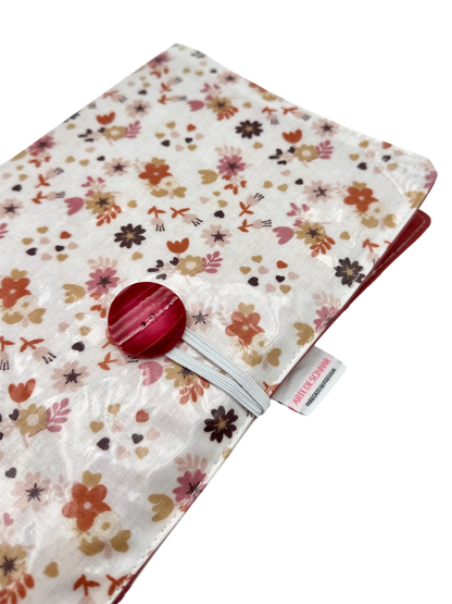 Capa de livro com flores bege