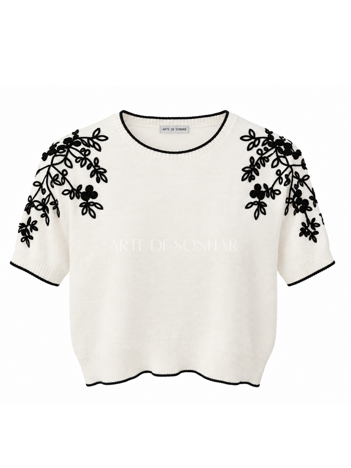Camisola de malha branca com flores pretas