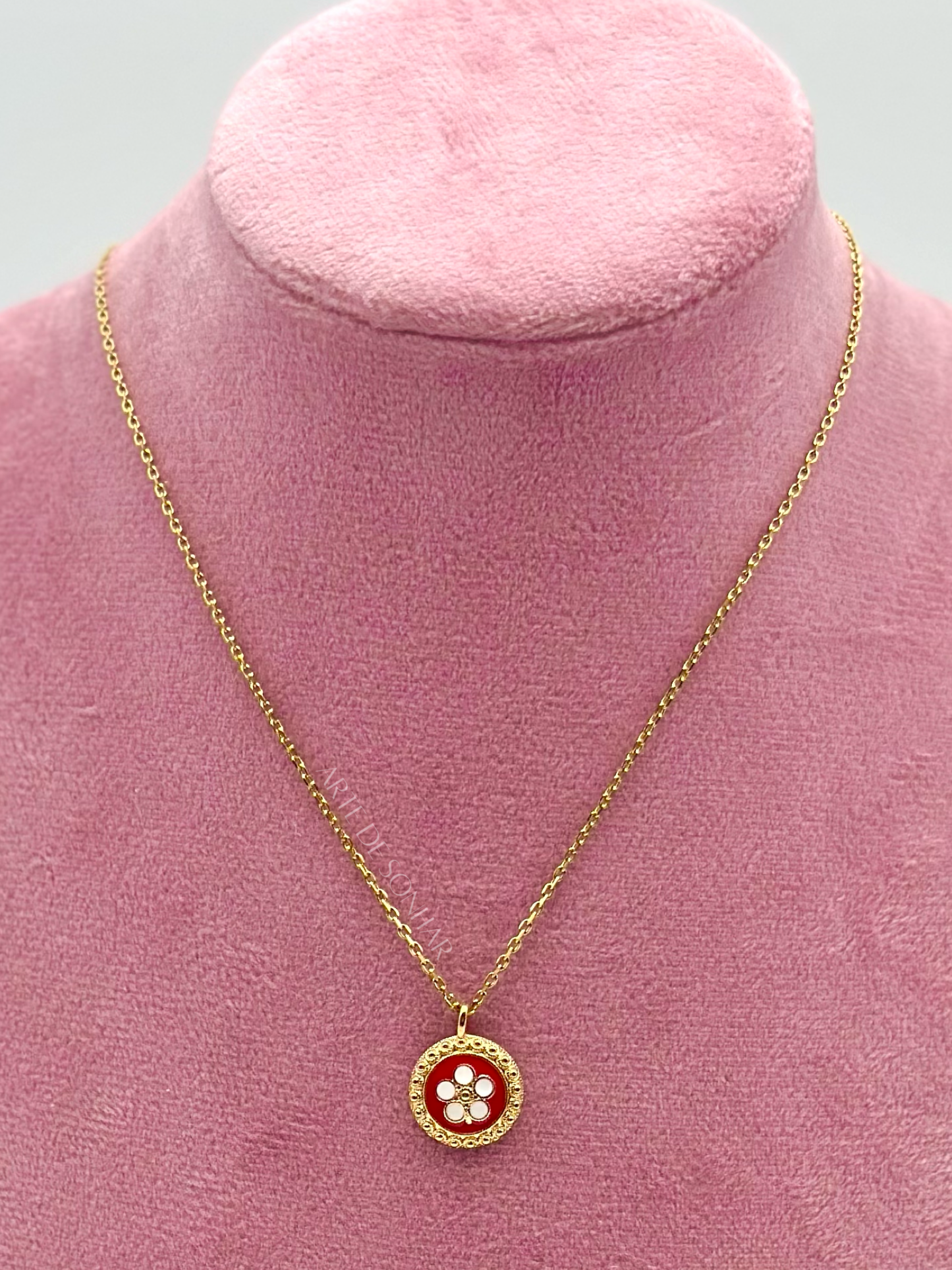 Colar caramujo vermelho